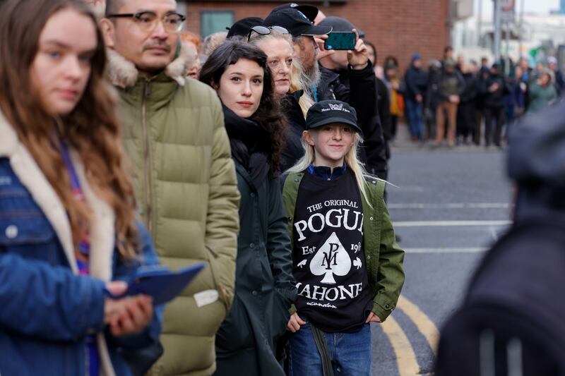 Sonny Wakefield from Drimnagh watching the funeral procession. 
Photograph: Alan Betson


