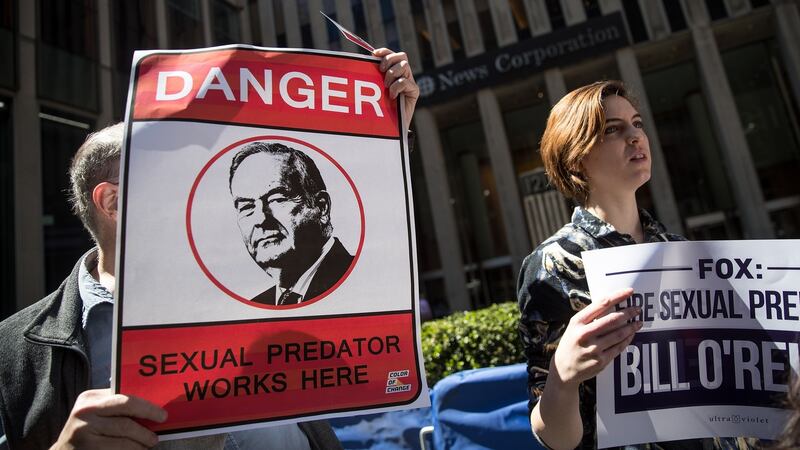 Demonstrators rally against Fox News television personality Bill O’Reilly outside of the News Corp. and Fox News headquarters in New York City. O’Reilly, has been the subject of numerous sexual harassment allegations and legal settlements. Photograph: Drew Angerer/Getty Images
