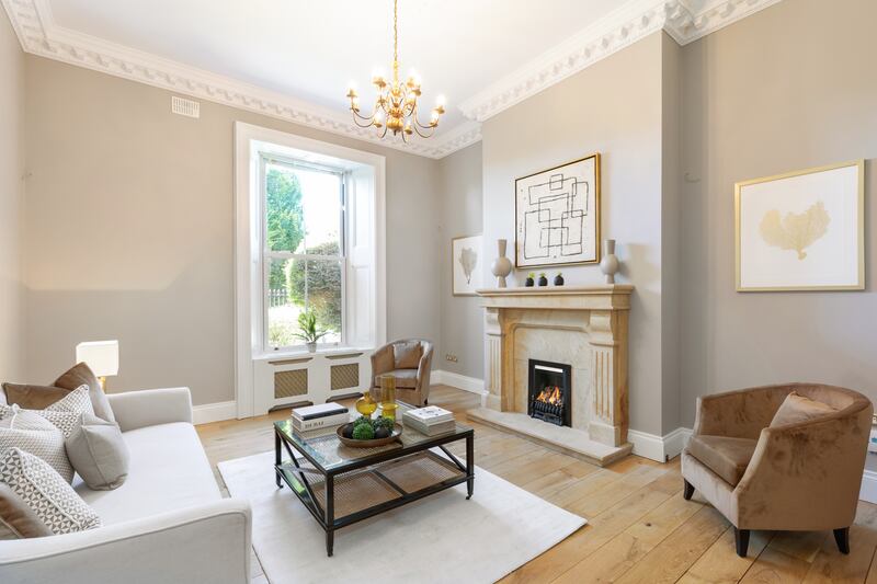 Study/library/family room with sandstone fireplace