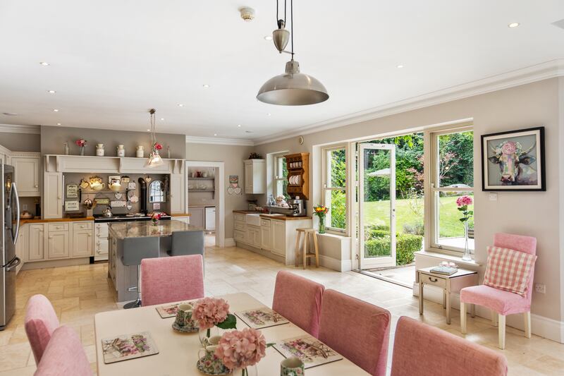 The kitchen/diningroom/family room stretches nearly the width of the back of Woodridge.