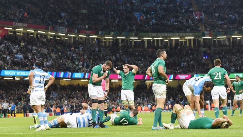 Irish and Argentinian players react following the final whistle. Photo: EPA