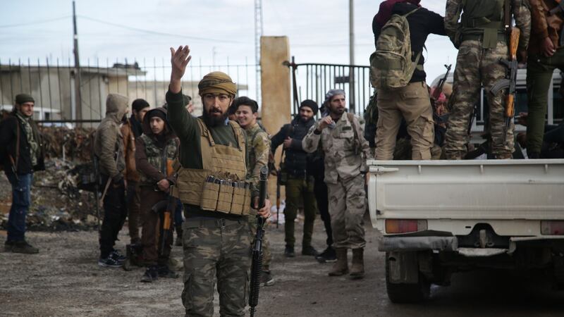 Turkish-backed Syrian fighters gather in the area of Sajour between the northern Syrian towns of Jarables and Manbij. Photograph: Bakr Alkasem/AFP/Getty Images