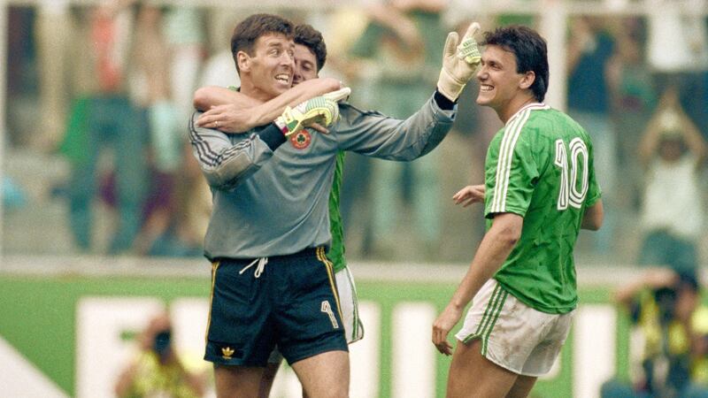 Bonner is congratulated by Andy Townsend and Tony Cascarino. Photo: David Cannon/Allsport/Getty Images