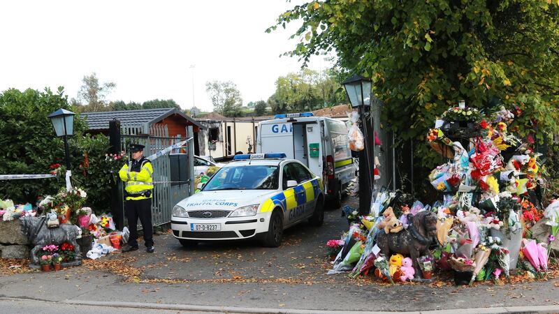 Floral tributes left at the site of the fire that claimed 10 lives in Carrickmines. Photograph: Nick Bradshaw
