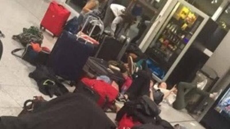 Bags scattered in Biarritz Airport after the group were informed their flight was cancelled.