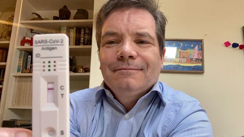 Ronan McGreevy with an at-home antigen test