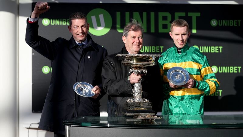 Trainer Gavin Cromwell, owner JP McManus and jockey Mark Walsh after Espoir D’Allen’s victory in  the Unibet Champion Hurdle at Cheltenham. Photograph: Simon Cooper/PA Wire
