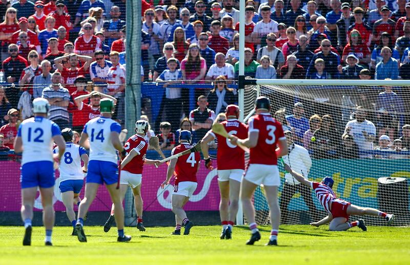 Waterford’s Jamie Barron scoring past Cork’s Patrick Colins in the Munster championship at Walsh Park, Co Waterford. Photograph: Ken Sutton/Inpho