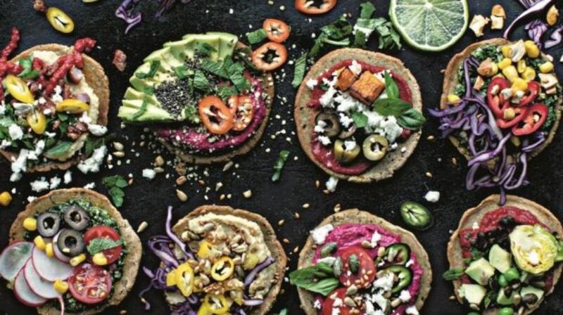 Mini oat flour pizzas with vegetarian toppings.