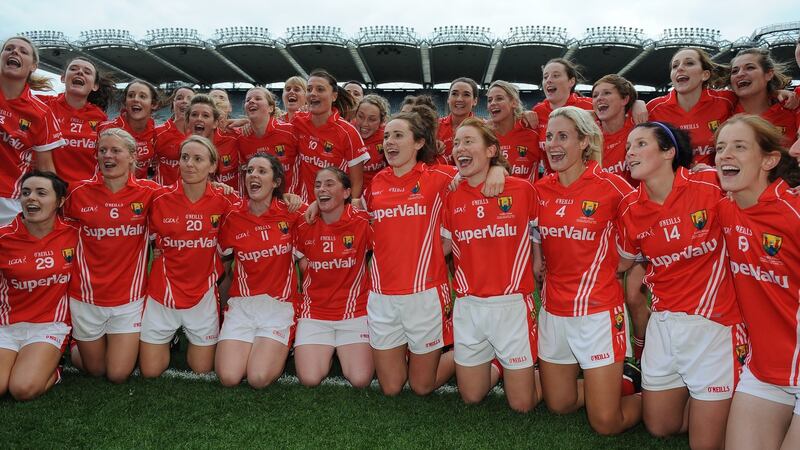 The Cork team celebrate after winning the 2014 All-Ireland.  Photograph: Tommy Grealy/Inpho