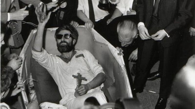 Mick Meaney celebrates winning the world record for being buried alive.  Photograph: RTÉ