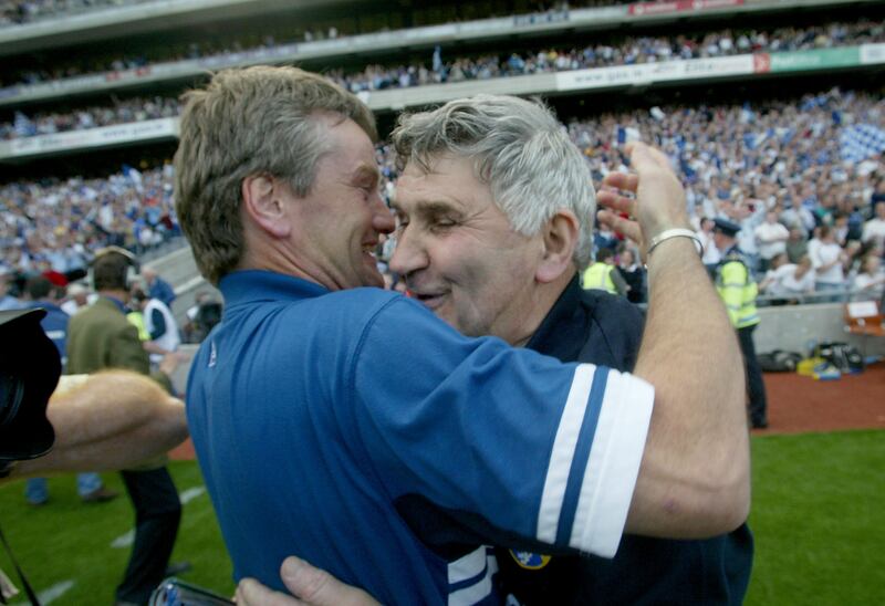 Manager Mick O'Dwyer celebrates with selector Declain O'Loughlin following Laois' Leinster final success in 2003. Photograph: Morgan Treacy