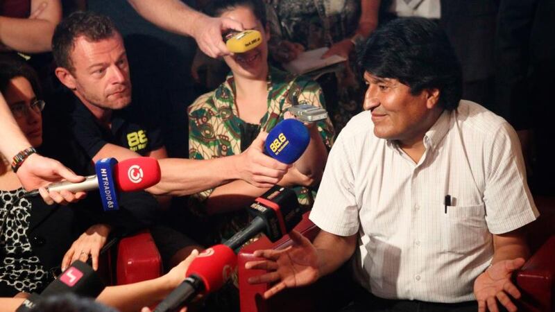 The Bolivian president addresses a news conference at the Vienna International Airport in Schwechat yesterday. Mr Morales said he was awaiting Spanish permission to fly home through its airspace after he refused Madrid’s request to inspect his plane following its diversion to Vienna. France and Portugal abruptly cancelled air permits for Mr Morales’ plane en route from Moscow on Tuesday. Photograph: Heinz-Peter Bader/Reuters