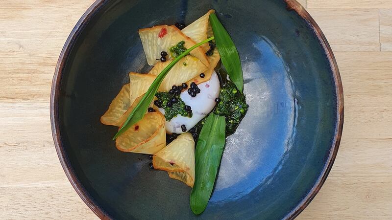 Fermented organic celeriac, with confit duck egg, wild garlic pesto and pickled elderberries