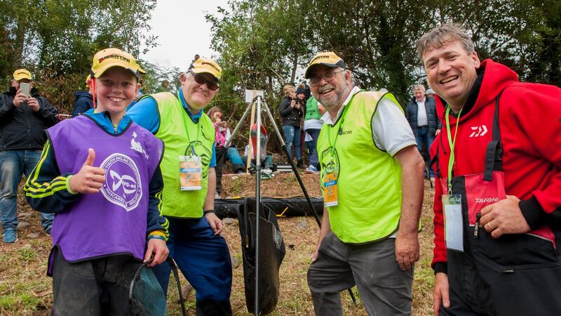 Eoin Rogers (Ireland U-15),  team captain, two-time world champion angler Cathal Hughes (right) along with officials Kevin Leahy and Mick Browne after the Weigh in World Youth Angling Championships at Inniscarra Lake, Coachford, Co Cork. Photograph:  Brian Lougheed
