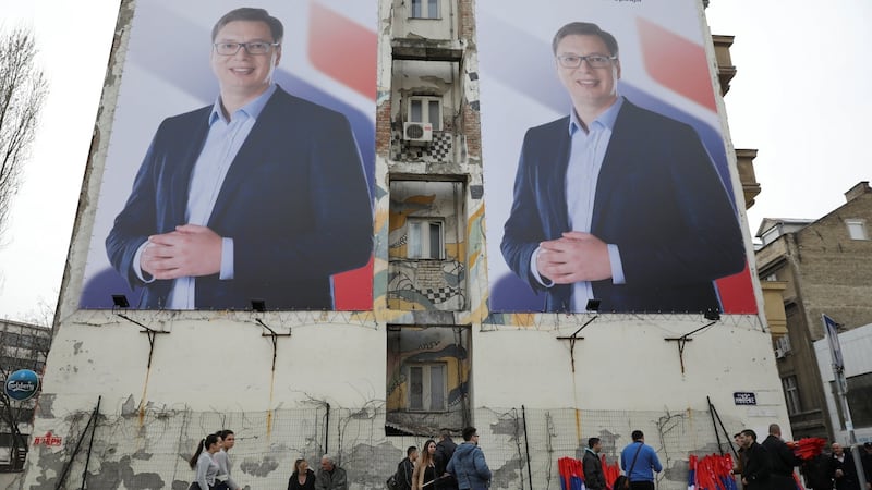 People pass posters of Serbian prime minister Aleksandar Vucic, who is hotly favoured to win this Sunday’s presidential election,  in Novi Sad, Serbia on March 18th.  Photograph:  Marko Djurica/Reuters