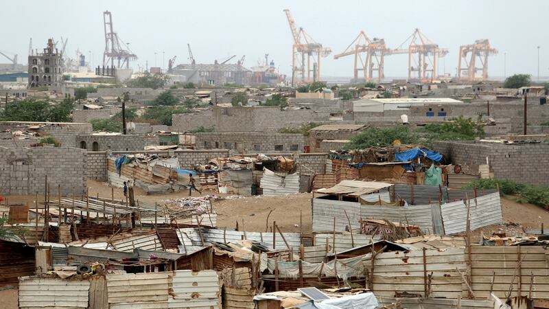 Port cranes in Hodeidah, Yemen,  from a nearby shantytown. The UN says 70% of humanitarian supplies and 90% of commercial supplies enter Yemen through the port. Photograph: Reuters