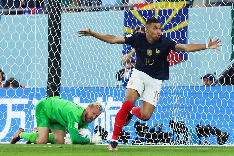 Kylian Mbappe celebrates after scoring his team's second goal during the group stage victory over Denmark at Stadium 974 in Doha, Qatar. Photograph: Liu Lu/VCG via Getty Images