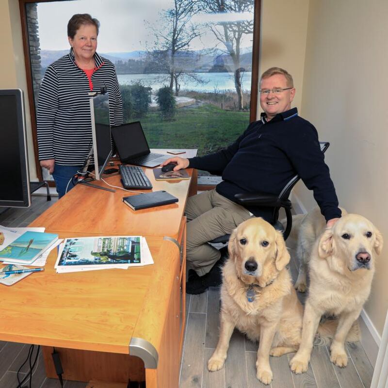 Liam and Sue McLoughlin with Max and Toby in their home office at Tahilla, Sneem, Co Kerry. Photograph: Valerie O’Sullivan
