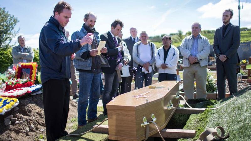 Hard times: the funeral of Josef Pavelka at Drumcliff cemetery in Ennis. Photograph: Eamon Ward