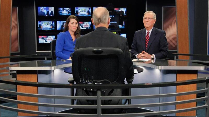 Talking politics: Alison Lundergan Grimes with Mitch McConnell before their TV debate. Photograph: Pablo Alcala/Reuters