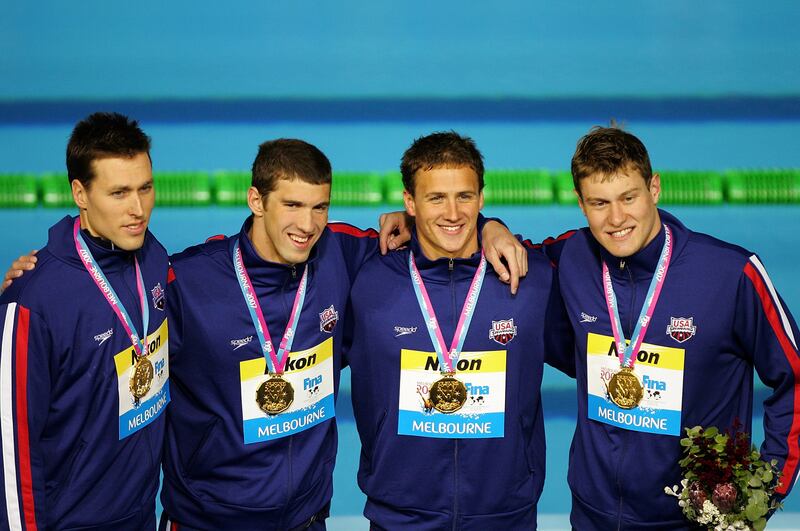 (L-R) Klete Keller, Michael Phelps, Ryan Lochte and Peter Vanderkaay of the USA pose following victory and a new world record in the Men's 4 x 200m Freestyle Final during World Championships in 2007. Photograph: Ezra Shaw/Getty Images