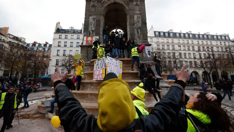 Protesters gather in central Paris. Photograph: EPA