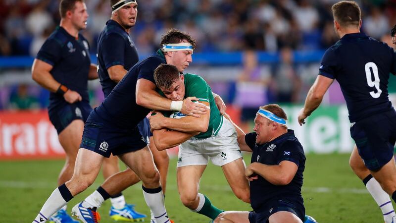 Garry Ringrose is tackled during the match. Photo: Odd Andersen/AFP/Getty Images