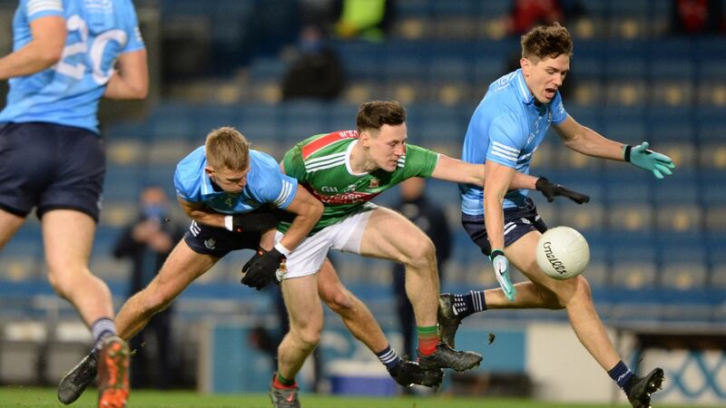 Dublin duo Jonny Cooper and Michael Fitzsimons in action against Mayo’s  Diarmuid O’Connor during the All-Ireland Final at Croke Park. Photograph:  Dara Mac Dónaill