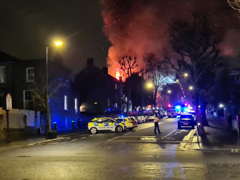 Firefighters tackling a blaze at St Mark's Church. Photograph from the Twitter account @ShohaibShah, used with permission 