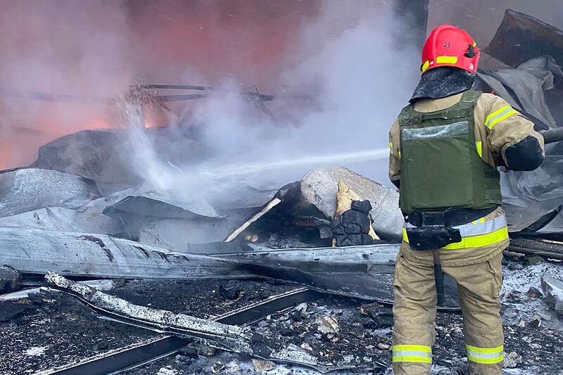A firefighter works to extinguish a fire after a Russian missile attack in Kryvyi Rih, Ukraine. Photograph: Ukrainian Emergency Service/AP