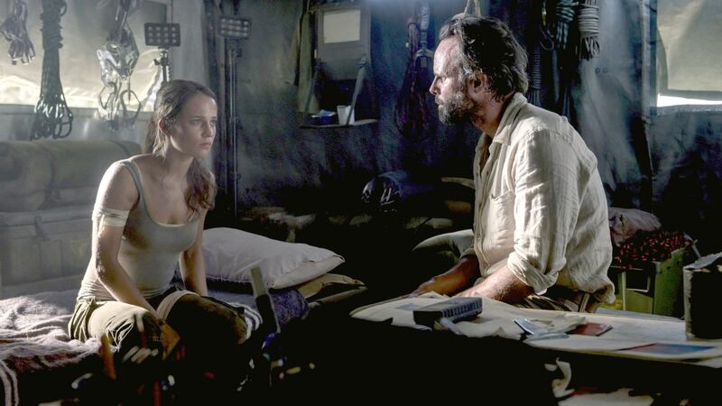 Alicia Vikander and Walton Goggins in Tomb Raider (2018)