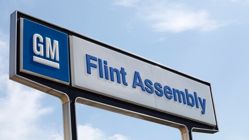 The signage outside General Motors in Flint, Michigan: the company was founded here in 1908. Photograph: Jeff Kowalsky / AFP