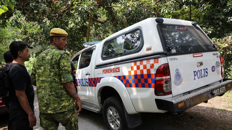 A police forensic vehicle enters the Dusun resort, where 15-year-old Irish girl Nóra Quoirin went missing in Seremban, Malaysia. Photograph: Lim Huey Teng/Reuters