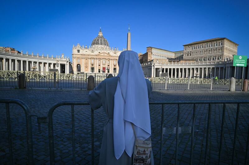 A nun stands in front of St Peter's Basilica a day after the death of Pope Francis. Photograph: Andreas Solaro/Getty