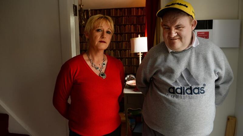 Meave Kennedy with her brother Eamonn at home in Donnycarney: “It seemed to me that he was being chemically restrained to make it easier to control his behaviour.” Photograph: Cyril Byrne