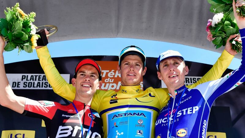 Denmark’s Jakob Fuglsang, second-placed Australia’s Richie Porte  and third-placed Ireland’s Daniel Martin celebrate on the podium. Photograph: Getty Images