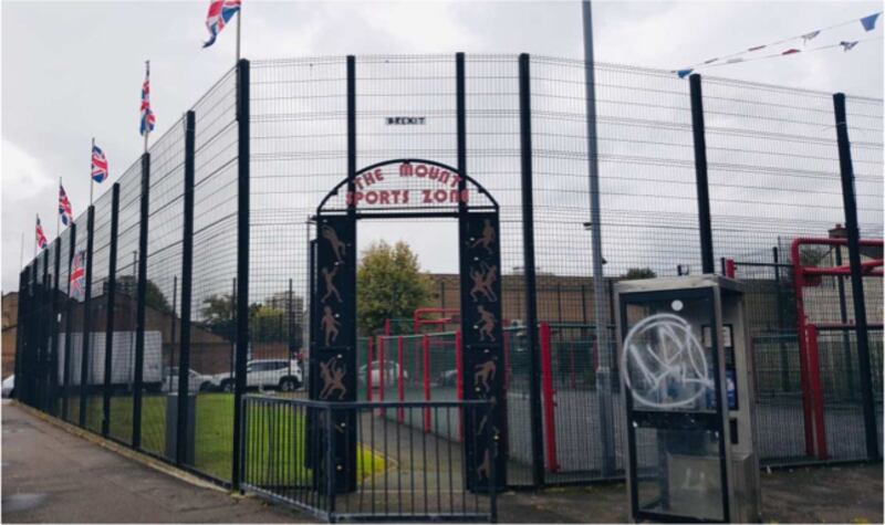 A children’s play park in Tigers Bay with all paramilitary flags removed.