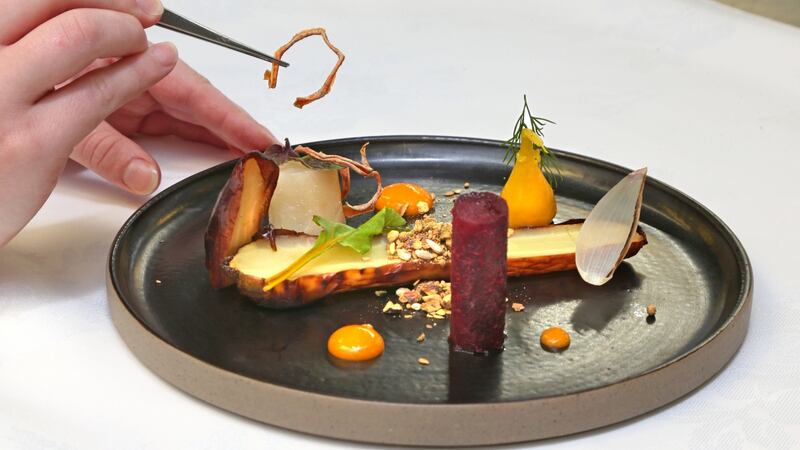 Caoimhe Gunn, a culinary arts student, prepares a vegetarian plate of carrots and beetroot. Photograph: Joe O’Shaughnessy