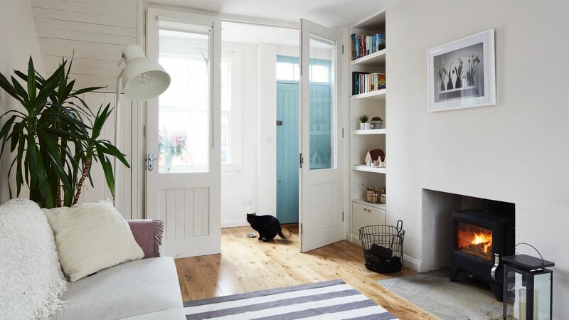 A new hallway was created beside the front door which used to open straight into the living room. Photograph: Philip Lauterbach