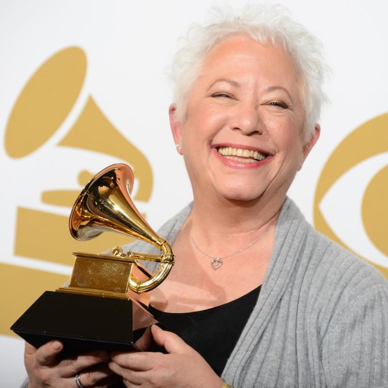 Ian poses with her Grammy award  for best spoken word album in 2013. Photograph: Robyn Beck/AFP via Getty