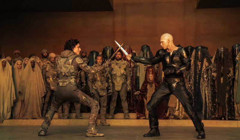 Timothée Chalamet as Paul Atreides battles Austin Butler as Feyd-Rautha in Dune: Part Two.