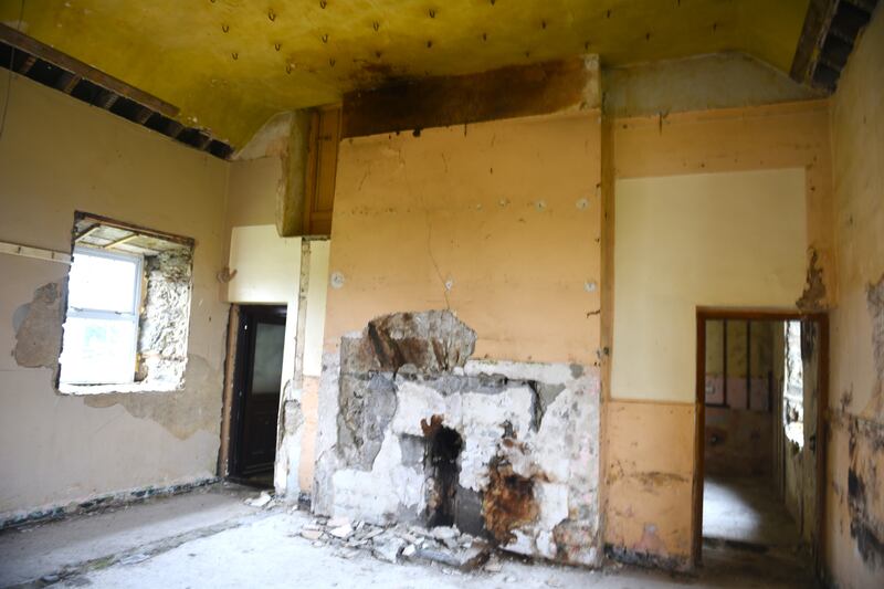 Removing two fake ceilings revealed the original kitchen featuring 16ft-high ceilings, a huge hearth and 70 game hooks in the ceiling