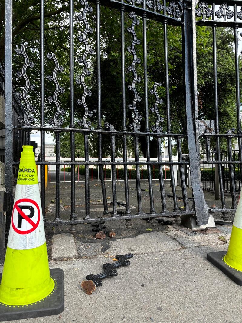 The damaged gates at Government Buildings, Dublin. Photograph: Simon Carswell and Harry McGee