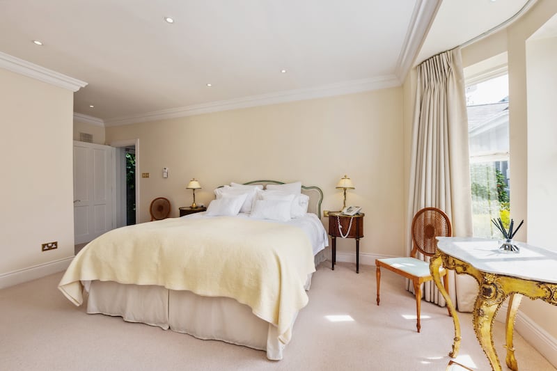 The principal bedroom suite is a large, stunning and sun-filled space, with windows that overlook the courtyard, an en suite and a walk-in wardrobe. 
