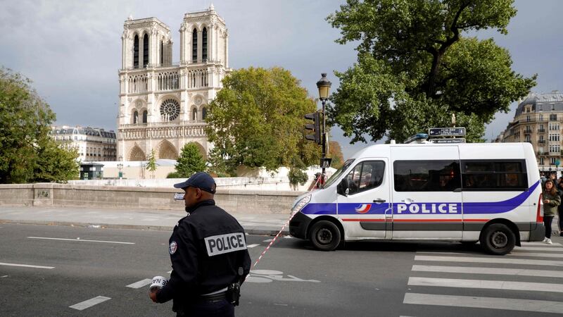 A police officers install a security perimeter near Paris prefecture de police (police headquarters) after four officers were killed in a knife attack. Photograph: Geoffrey Van Der Hasselt/AFP via Getty Images