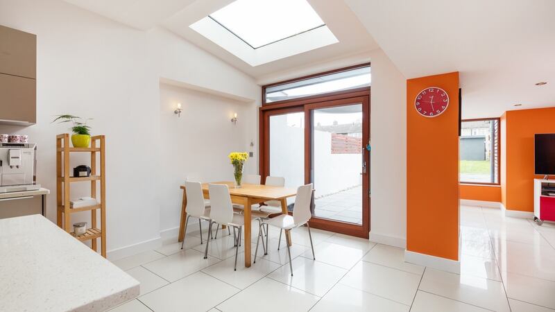 The open-plan kitchen-dining and living area.