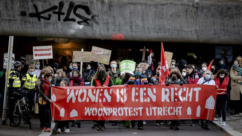 Dutch government introduced a three-week ‘limited lockdown’ which reintroduced masks, early closing for bars, among other things. Photograph: Robin van Lonkhuijsen/AFP via Getty