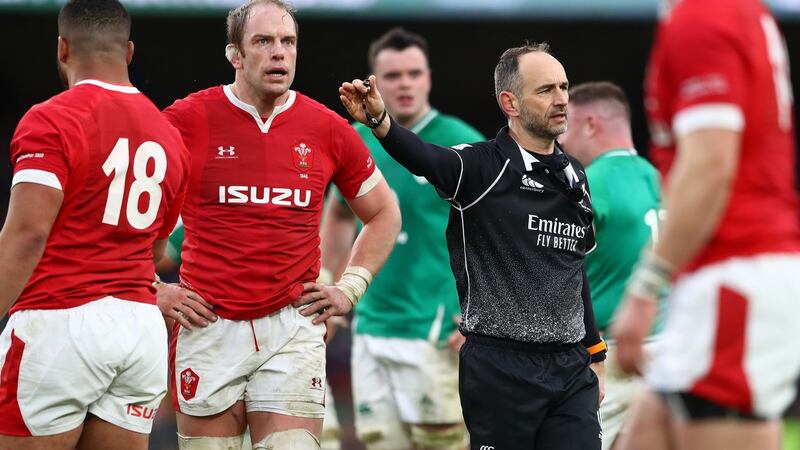 Romain Poite and Wales captain Alun Wyn Jones. Photograph: Michael Steele/Getty