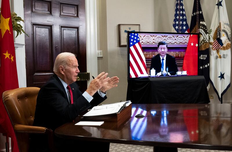 US president Joe Biden takes notes during a video summit with President Xi Jinping of China on November 15th last. Photograph: Doug Mills/New York Times